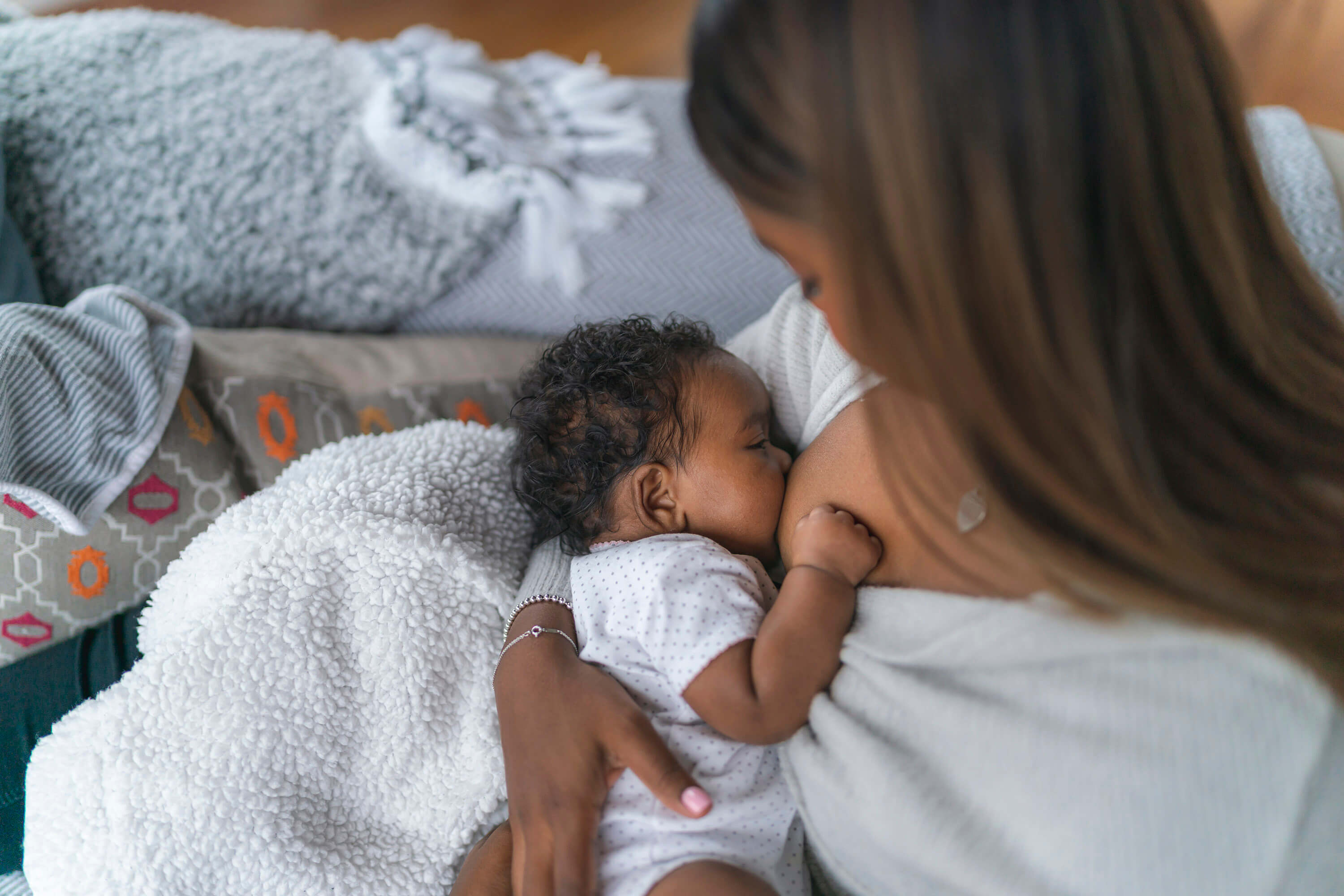 A woman breastfeeding her child