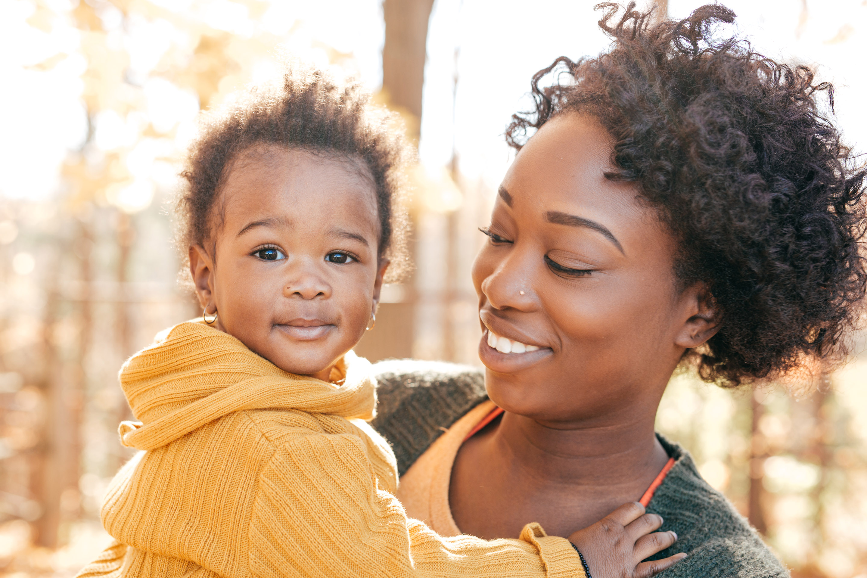 A woman holding an infant